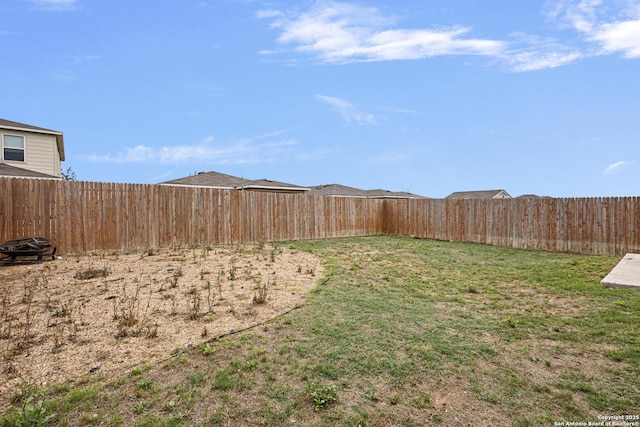 view of yard featuring a fenced backyard