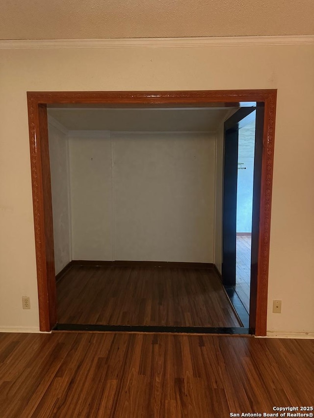 1074 Honeytree St, San Antonio, TX 78245 - corridor with baseboards, ornamental molding, and wood finished floors
