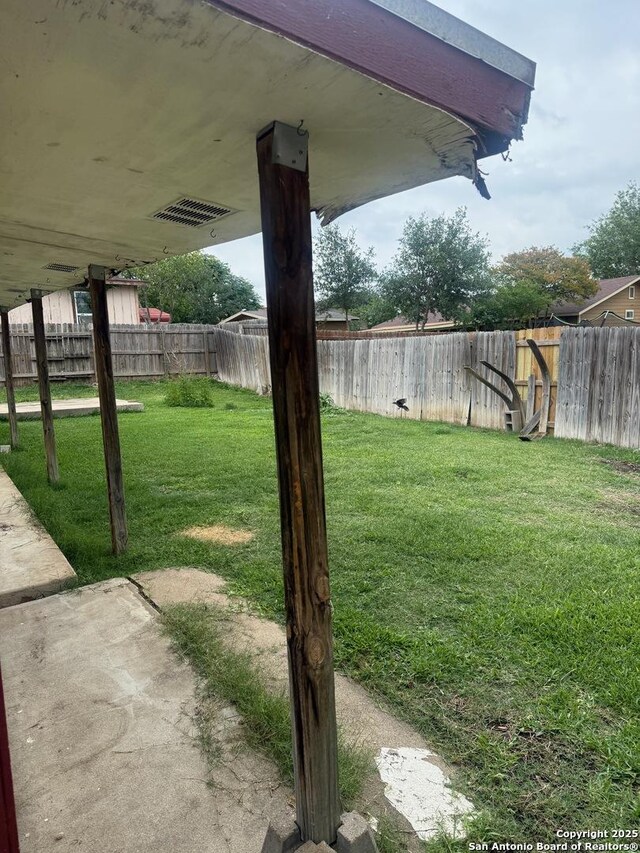 1074 Honeytree St, San Antonio, TX 78245 - view of yard with a fenced backyard