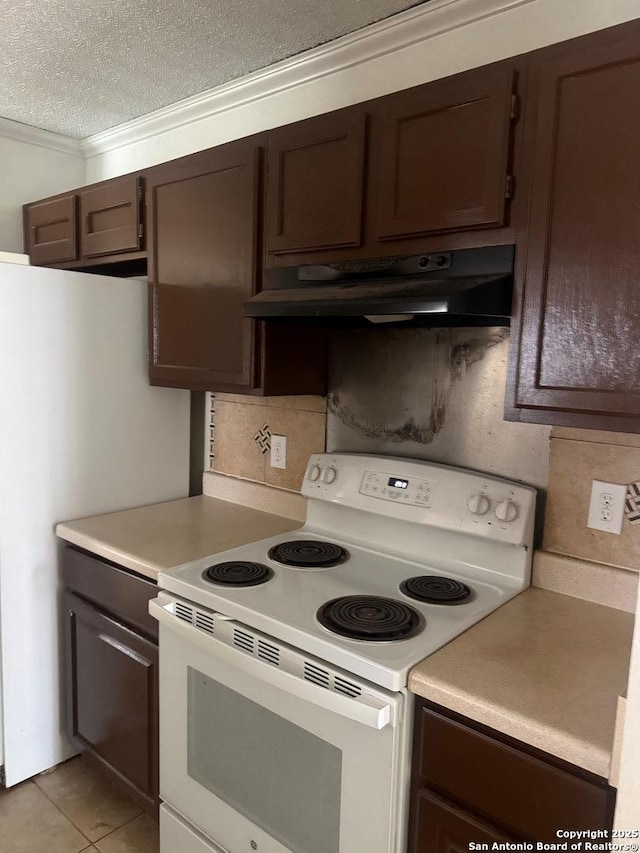 1074 Honeytree St, San Antonio, TX 78245 - kitchen with light countertops, white electric range oven, under cabinet range hood, and dark brown cabinets