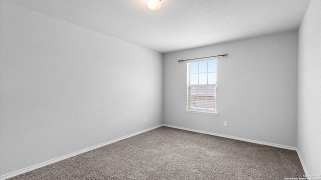 7350 Braes Cor, San Antonio, TX 78244 - empty room with carpet and baseboards