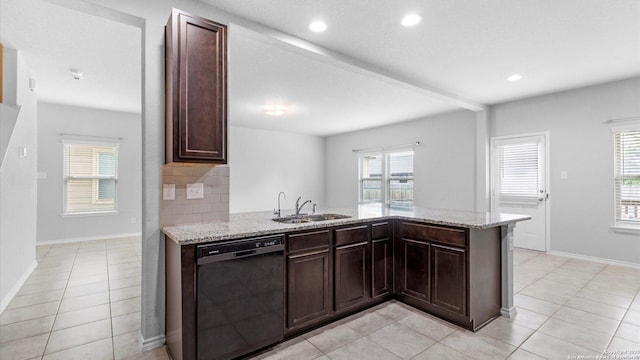 7350 Braes Cor, San Antonio, TX 78244 - kitchen featuring dishwasher, a sink, light stone counters, a peninsula, and recessed lighting