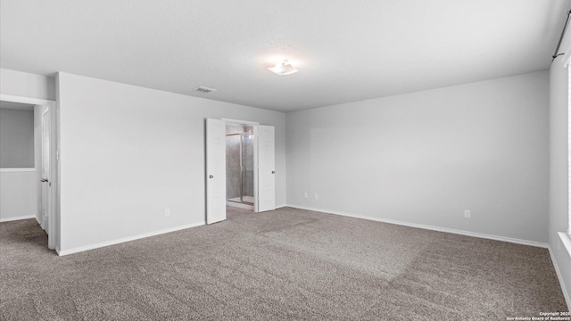 7350 Braes Cor, San Antonio, TX 78244 - unfurnished bedroom with carpet flooring, baseboards, and ensuite bath
