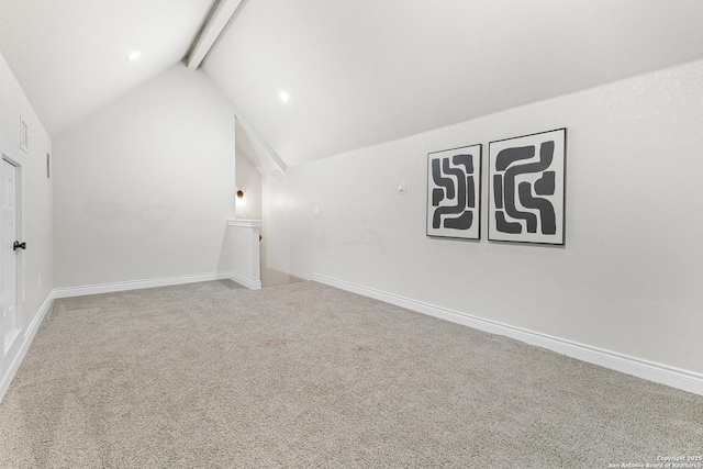 bonus room with carpet flooring, baseboards, and lofted ceiling with beams