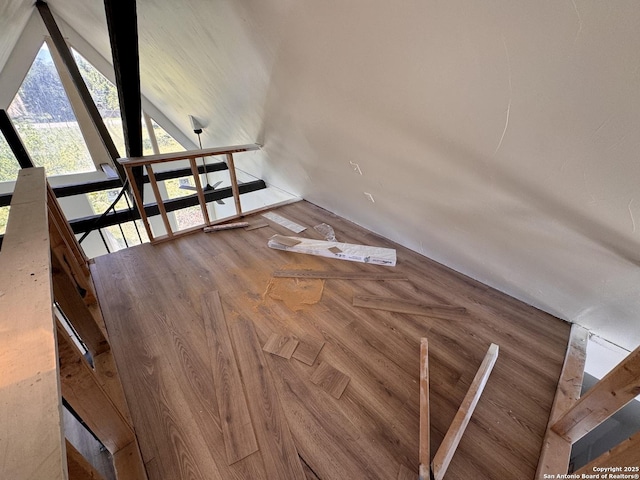 staircase with vaulted ceiling