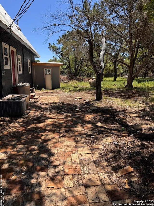 view of yard featuring cooling unit