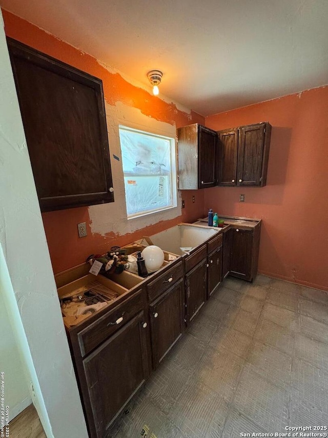 kitchen with dark brown cabinets