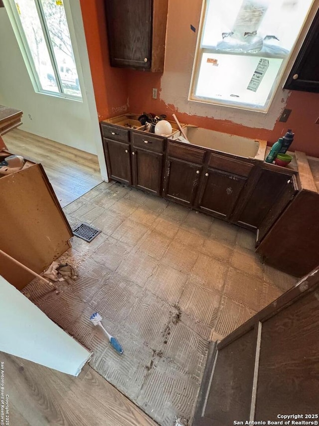 kitchen with visible vents and dark brown cabinetry