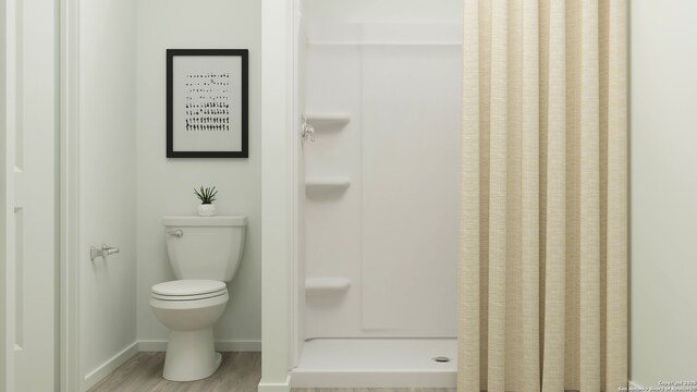 335 Payton Pl, Marion, TX 78124 - full bathroom with toilet, baseboards, wood finished floors, and a stall shower