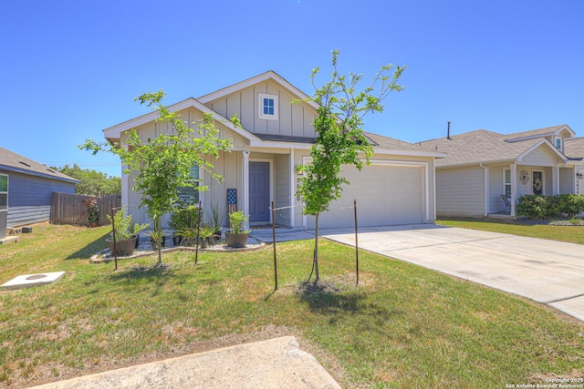 5660 Jasmine Spur, Bulverde, TX 78163 - view of front facade with a front lawn, fence, board and batten siding, concrete driveway, and an attached garage