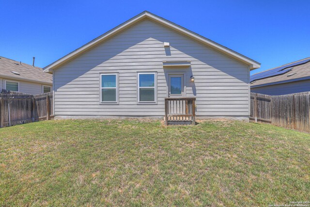 5660 Jasmine Spur, Bulverde, TX 78163 - rear view of property featuring a fenced backyard and a yard