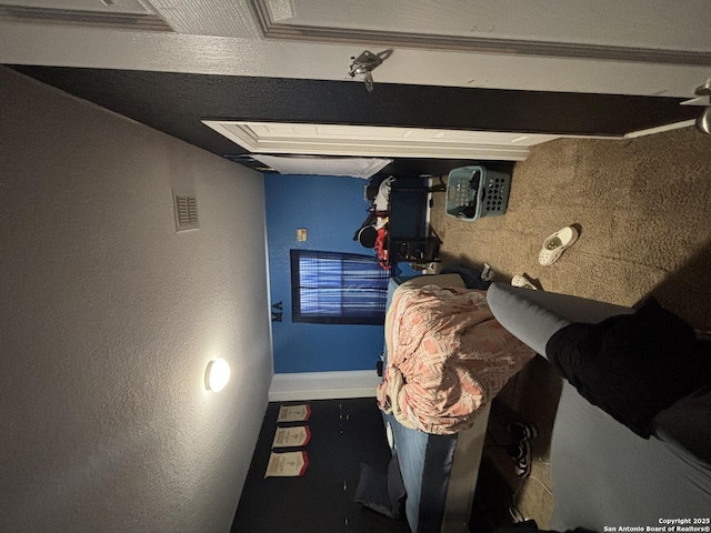 bedroom featuring baseboards