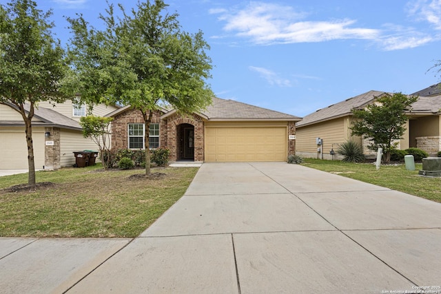 ranch-style house featuring an attached garage, a front yard, driveway, and brick siding