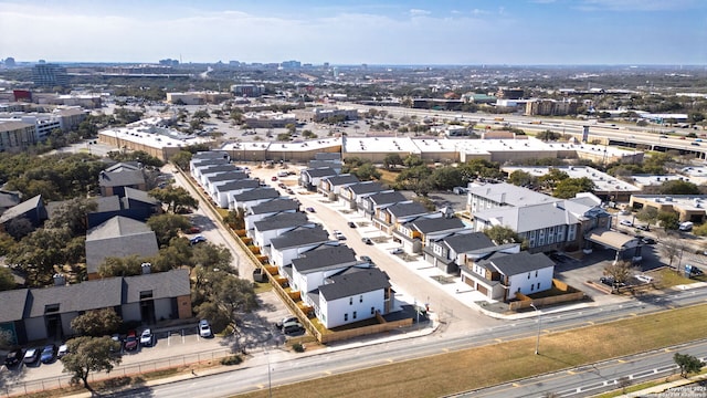 birds eye view of property featuring a city view