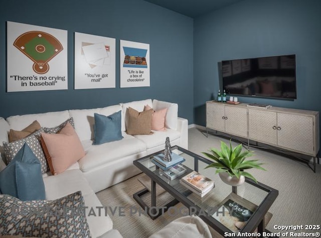 living area featuring carpet flooring