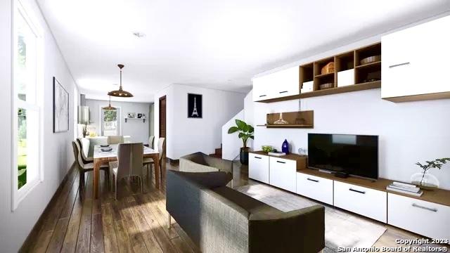 living area featuring hardwood / wood-style floors
