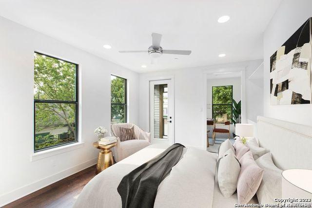 bedroom with recessed lighting, a ceiling fan, dark wood-style flooring, and baseboards