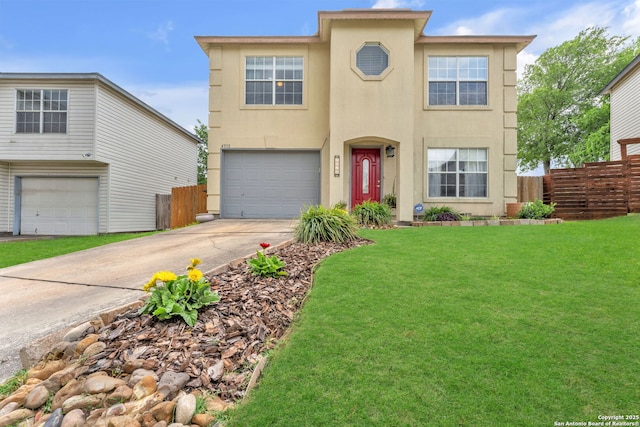 view of front facade with fence, stucco siding, a front lawn, and a garage