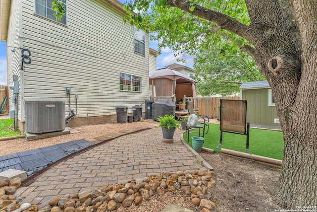 back of house with a patio area, fence, a yard, and cooling unit