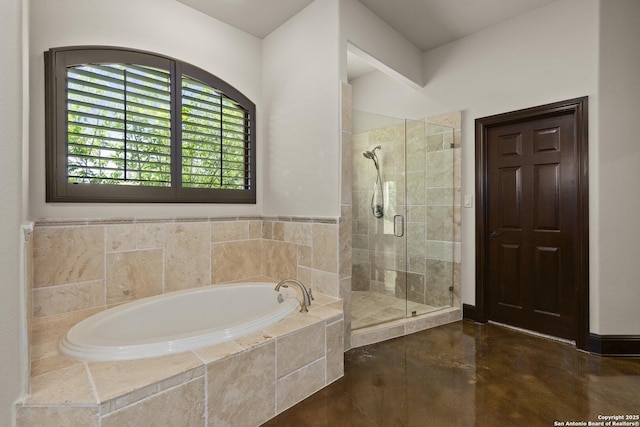 full bath with a garden tub, concrete flooring, and a shower stall