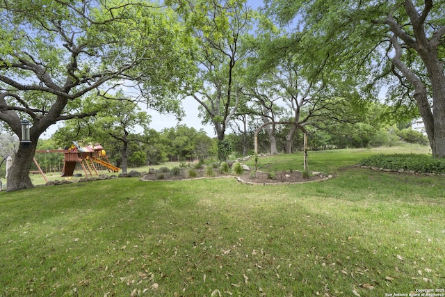 view of yard featuring a playground
