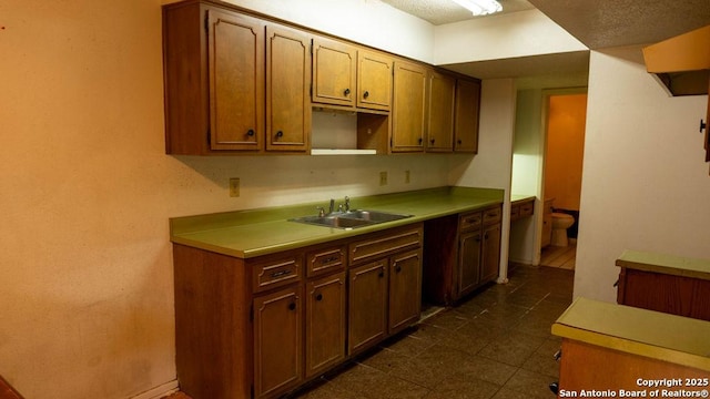 kitchen with a sink and light countertops