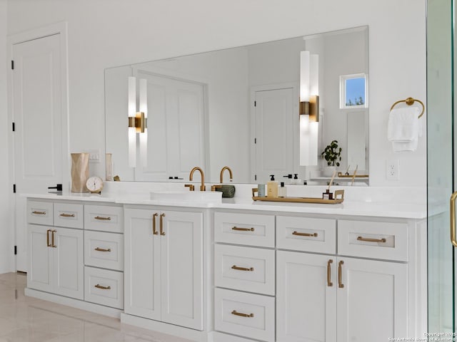 full bath with double vanity and a sink