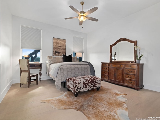 bedroom featuring baseboards, carpet, and a ceiling fan