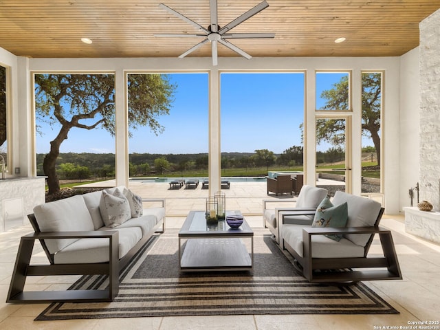 sunroom / solarium with wooden ceiling, plenty of natural light, and recessed lighting
