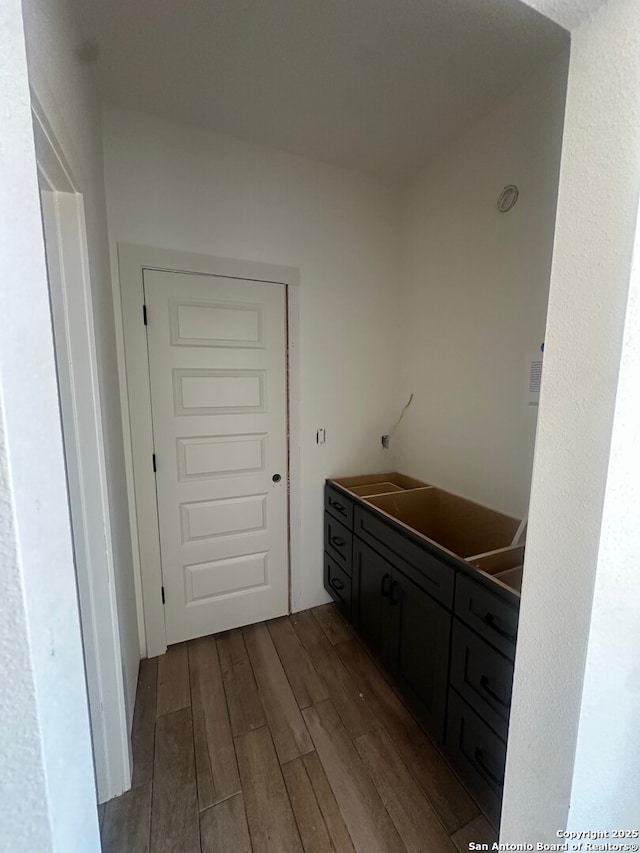 434 Hanging Oak, Spring Branch, TX 78070 - laundry room featuring dark wood-style flooring