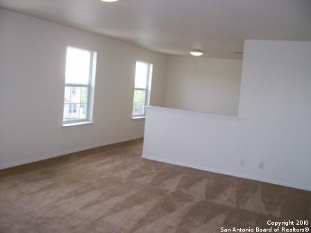 San Antonio, TX 78244 - carpeted spare room featuring baseboards