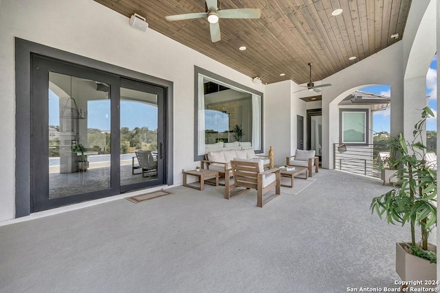 view of patio featuring a ceiling fan and outdoor lounge area