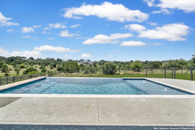 view of pool featuring fence and a fenced in pool