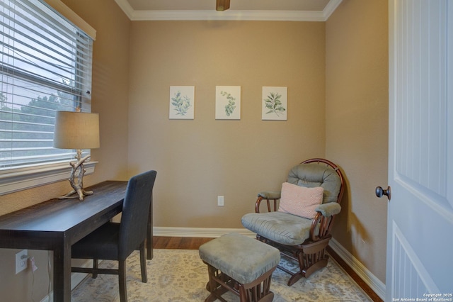 office space with baseboards, ornamental molding, and wood finished floors