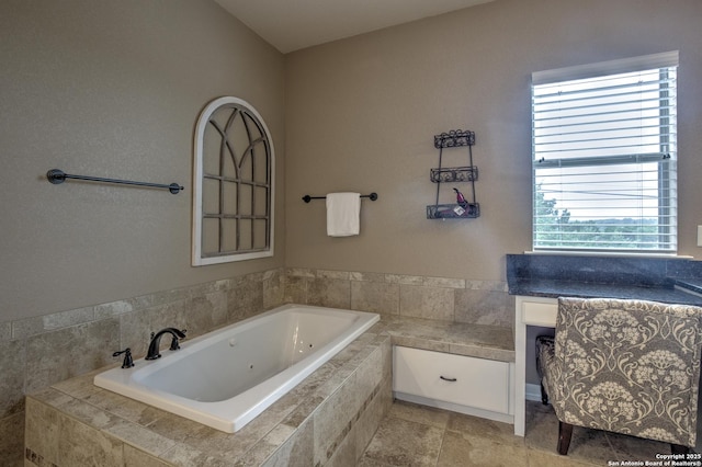 full bathroom featuring a jetted tub
