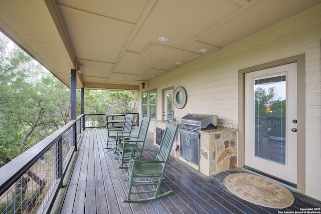 deck featuring exterior kitchen