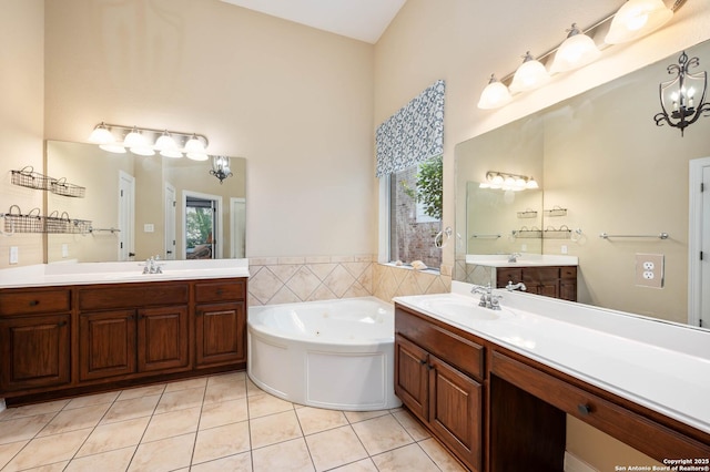 18607 Double Frk, San Antonio, TX 78258 - bathroom featuring a whirlpool tub, a sink, tile patterned floors, and two vanities
