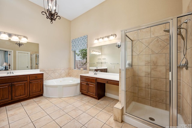 18607 Double Frk, San Antonio, TX 78258 - full bath with tile patterned flooring, a bath, two vanities, a sink, and a stall shower
