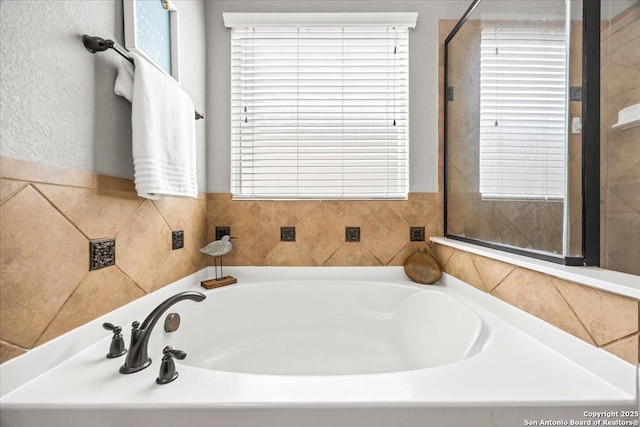 full bathroom with a bath