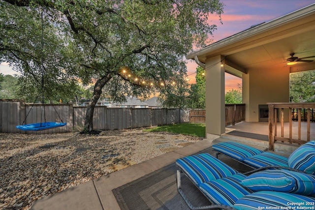 view of patio / terrace with ceiling fan and a fenced backyard