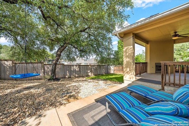 view of patio with a ceiling fan and a fenced backyard