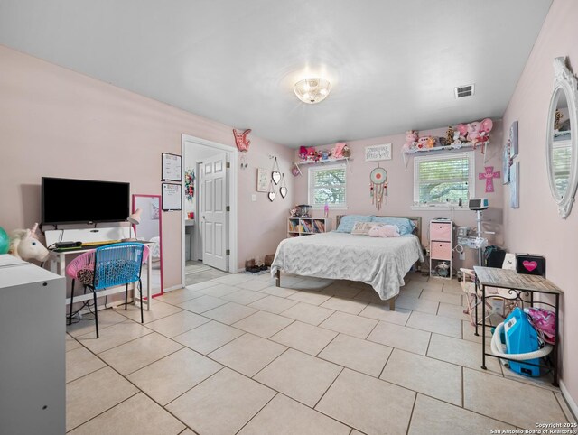 23 Sunrise, Pleasanton, TX 78064 - bedroom with visible vents and light tile patterned floors