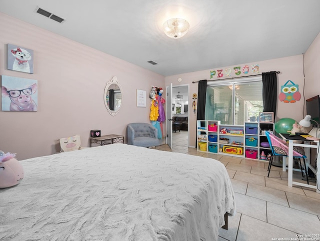 23 Sunrise, Pleasanton, TX 78064 - tiled bedroom featuring visible vents