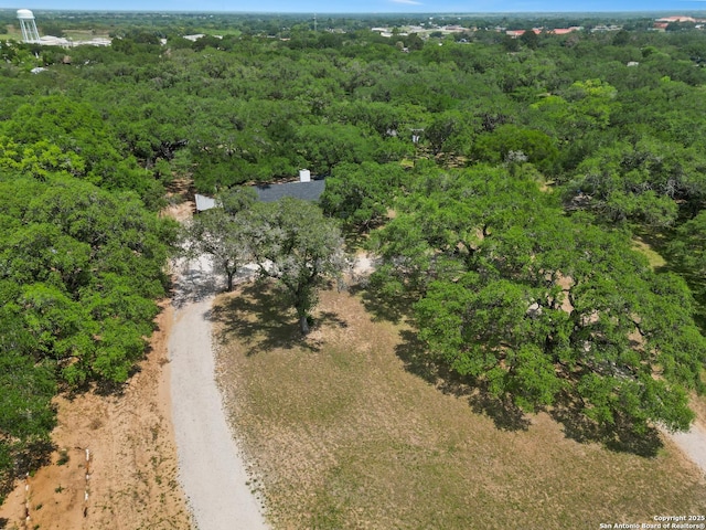 23 Sunrise, Pleasanton, TX 78064 - aerial view featuring a view of trees