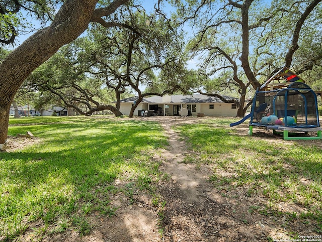 23 Sunrise, Pleasanton, TX 78064 - view of yard with playground community