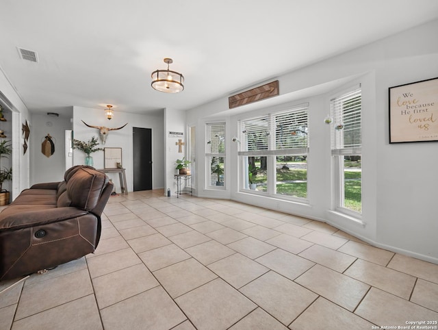 23 Sunrise, Pleasanton, TX 78064 - living room featuring visible vents and light tile patterned floors