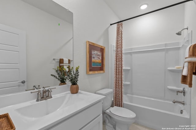 bathroom with vanity, tile patterned flooring, shower / bath combo with shower curtain, and toilet