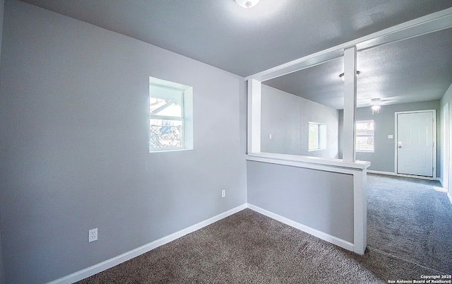 204 Division, San Antonio, TX 78214 - carpeted empty room with a ceiling fan, baseboards, and plenty of natural light