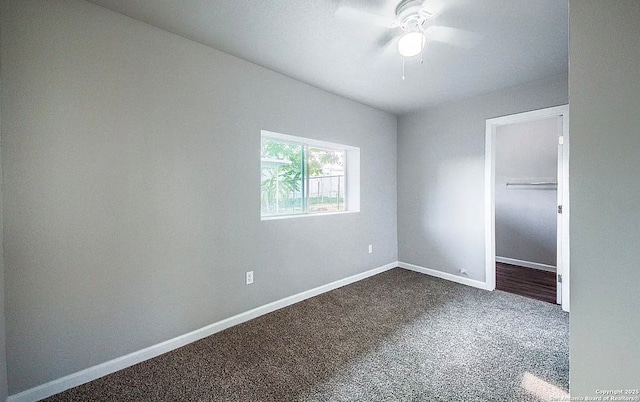 204 Division, San Antonio, TX 78214 - empty room with baseboards, a ceiling fan, and dark colored carpet