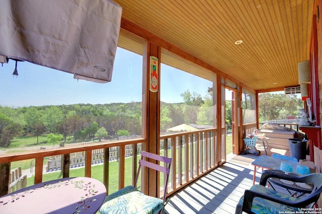 324 E Headwaters Rnch, Kendalia, TX 78027 - wooden deck featuring a forest view